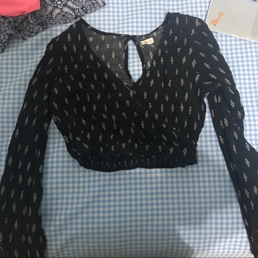 black patterned wrap top